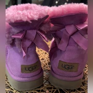 Pink UGG boots with purple bows #shearling #winter
